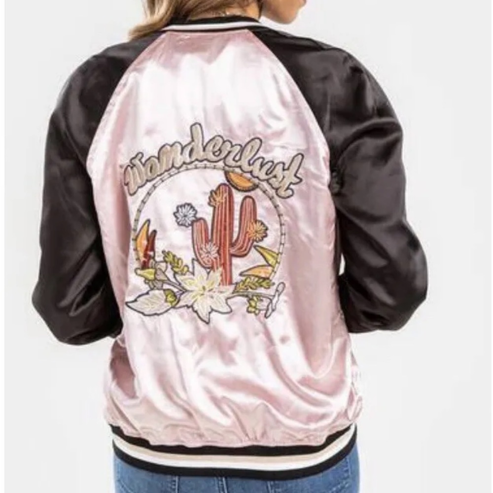 New in pkg ‘Wanderlust’ bomber jacket in Sz medium